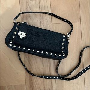 Valentino small rockstud leather grainy calfskin crossbody bag.